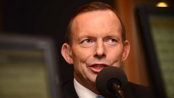Prime Minister Tony Abbott says he made a mistake to wink during an interview on the budget with a sex hotline worker.
