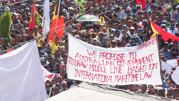 At least 10,000 people protest in Dili last year against Australia's stance on the oil and gas meridian line in the Timor Sea. 