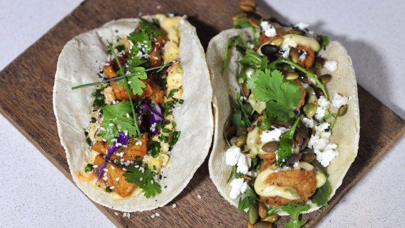Crispy chicken, slaw, honey and agave glaze taco with spiced pumpkin goats cheese, roquette, coriander aioli taco