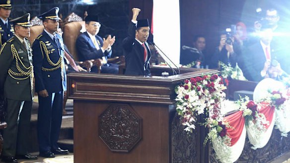Indonesian President Joko Widodo shouts "Merdeka" during his speech at his inauguration ceremony at the People's Consultative Assembly (MPR) in Jakarta  on Monday.