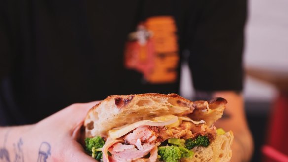 The porchetta sandwich, one of several options alongside bagels and coffee at the New York deli-inspired venue.