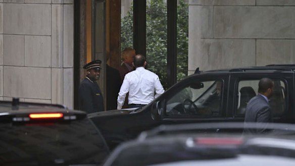 Mr Abbott and Ms Credlin arrive for dinner with Rupert Murdoch.