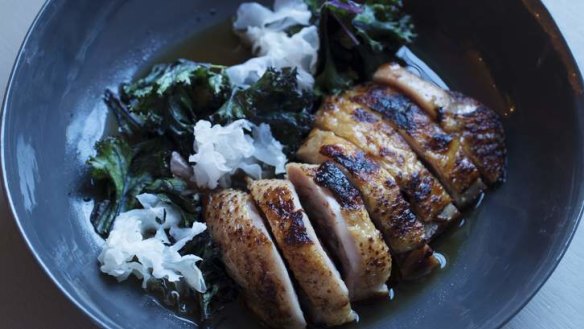 Roast chicken with purple kale and garlic puree.