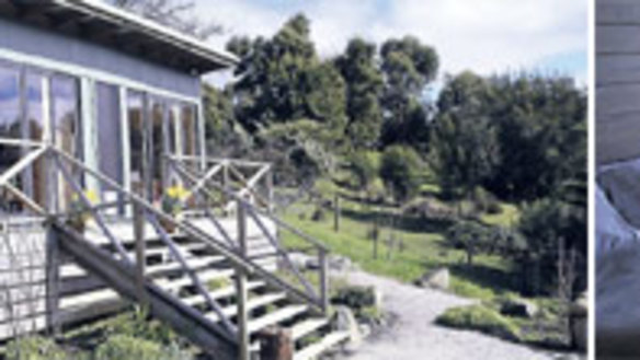 Zesty nest ... Lime Tree Cottage has views across Apollo Bay; the comfortable bedroom.