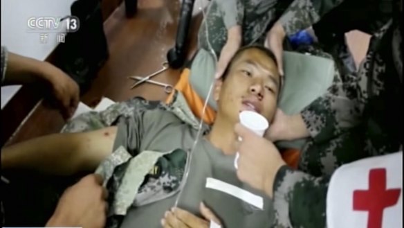 Footage released by China's CCTV shows Chinese UN peacekeepers tending to a wounded colleague after an attack on an armoured personal carrier in Jebel in South Sudan. Two Chinese peacekeepers were reported killed in the attacks.