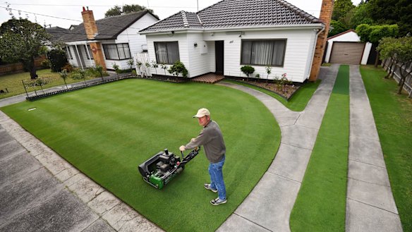 Chris Sadowski on his near perfect front lawn at his Oakleigh South home. 