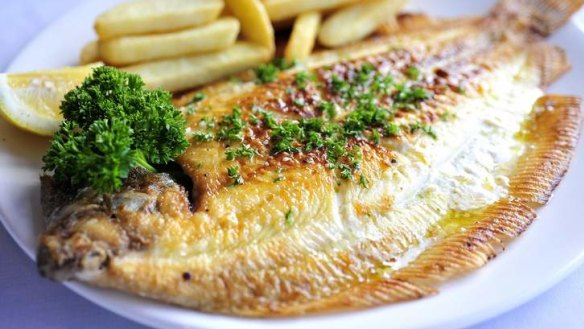 Grilled lemon sole served with hand-cut wedges.