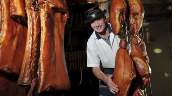 Richard Odell, of the Griffith Butchery, with a Christmas ham.