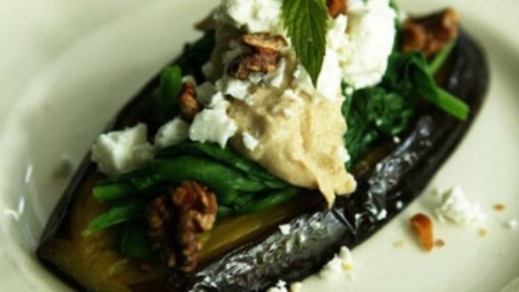 Baked eggplant with spinach, tahini and mint