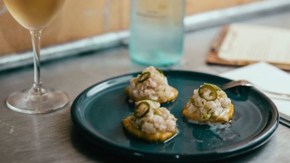 Tostones with snapper ceviche and pineapple vinegar.