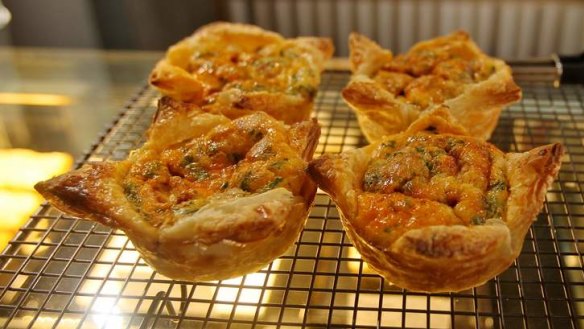 Egg, bacon, onion and tomato pastries.