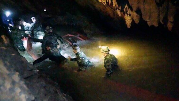 Thai rescue teams search inside cave complex.