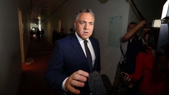 Treasurer Joe Hockey departs the press gallery after a television interview on Sunday. Photo: Andrew Meares