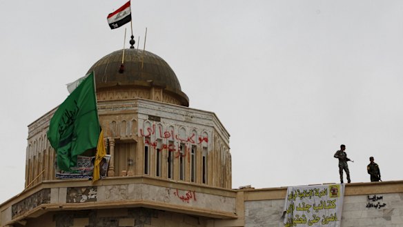 Iraqi security forces on the gate of Tikrit.