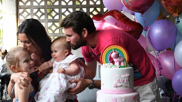Bethan McElwee and her husband Johnny with Aviana and their niece at Aviana's first birthday party at their home in Darwin.