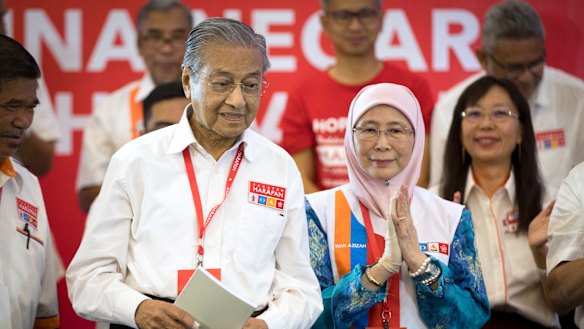 Unlikely alliance: Former prime minister Mahathir Mohamad at a rally in Shah Alam, Malaysia, earlier this month, with opposition leader Wan Azizah Wan Ismail. 