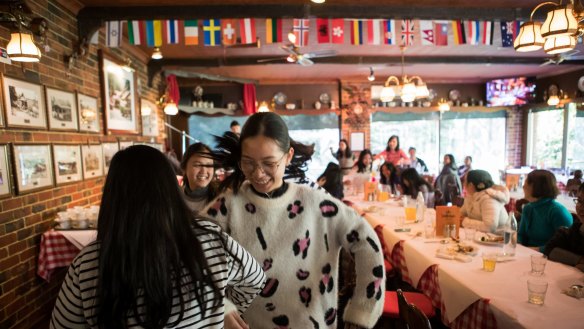 Diners dancing inside the Cuckoo Restaurant.