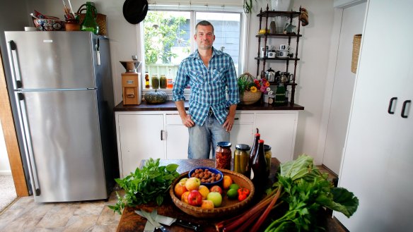 Nick Ritar in his kitchen, which is always full of fresh produce.