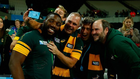 LONDON, ENGLAND - OCTOBER 30:  Tendai Mtawarira of South Africa poses for selfie photographs with fans after the 2015 Rugby World Cup Bronze Final match between South Africa and Argentina at the Olympic Stadium on October 30, 2015 in London, United Kingdom.  (Photo by Mike Hewitt/Getty Images)