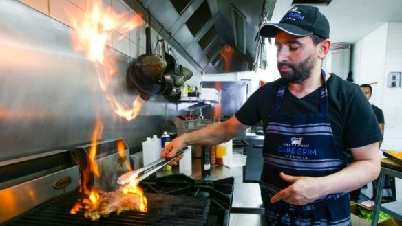Peter Zaidan cooking at his business in Bondi. 