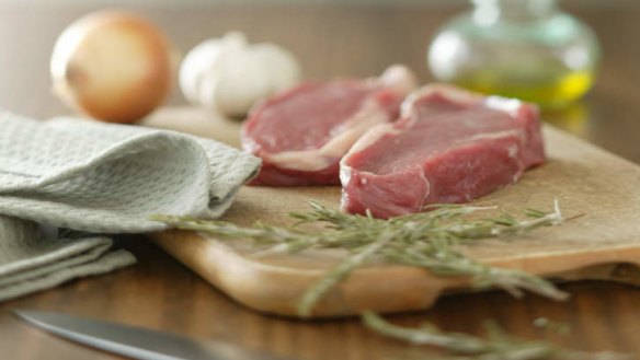 Is it hygienic to use a wooden chopping board for my meat?