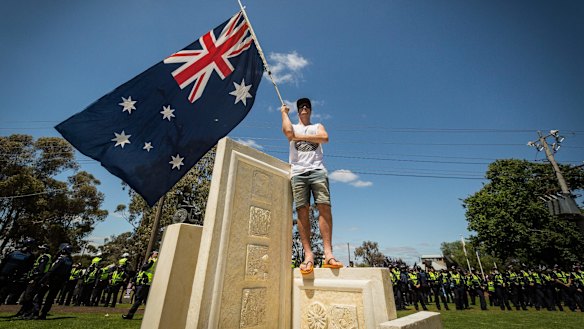 Dude, really? Isn't standing on the monument pretty darn disrespectful? And doing so in thongs is an OH&S issue waiting to happen.