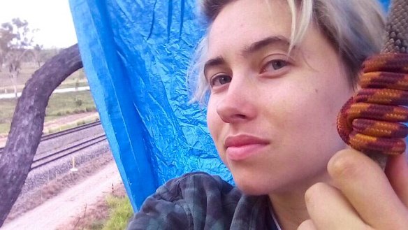 Tayla Jay Haggarty, from Frontline Action on Coal, was arrested after allegedly suspending herself from ropes, attached to a coal rail line.