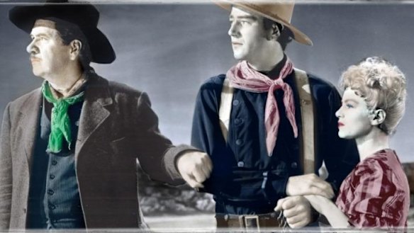 George Bancroft (left), John Wayne and Claire Trevor in Stagecoach.