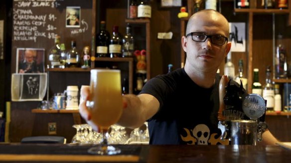 Boutique beers ... Co-owner Benjamin Nichols on the job at Scratch Bar in Milton.