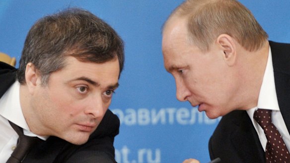 Russian Prime Minister Vladimir Putin, right, speaks to Vladislav Surkov, in 2012. 