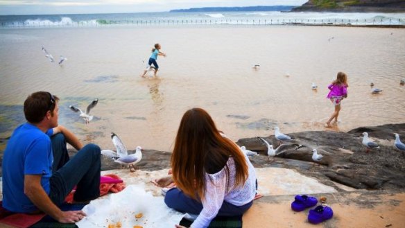 Fish and chips and seagull chasing at Newcastle's historic Canoe Pool.