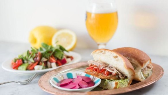 The balik ekmek fish sandwich is served in a soft bun, with pickled turnips.