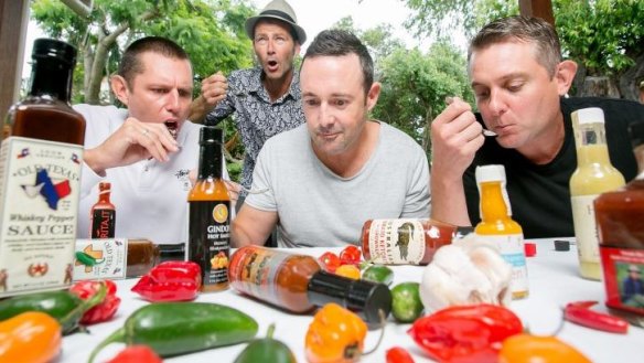 Lookin' for some hot stuff: Adam Whitby and mates Jody Coggan, Sean Masters and Matt Wilson do a hot sauce taste test.
