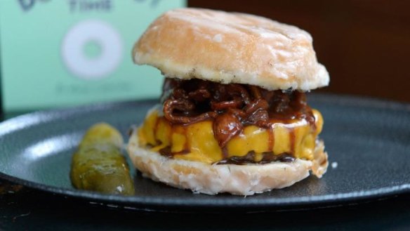 Ze Pickle's Nutella-smoked bacon burger in a doughnut bun.