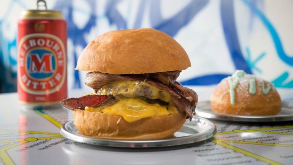 An 'Easey's Burger', Melbourne Bitter tinny and a blue heaven doughnut.