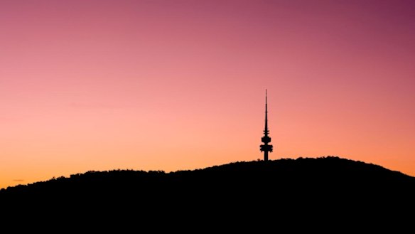 A image of a fiery sky as the sun sets over the Telstra Tower.