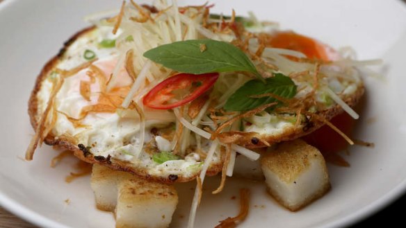 Rice cakes with fried egg, green papaya and chilli soy.
