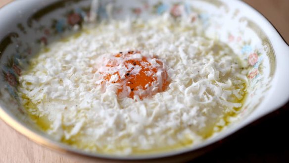 Comfort food: Rice polenta with confit egg yolk.