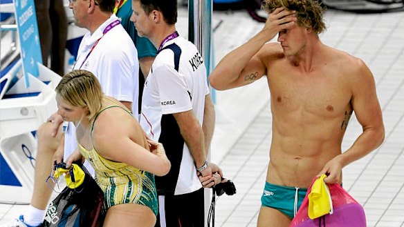 Australian swimmers Leisel Jones (left) and Kenrick Monk on the pooldeck yesterday.