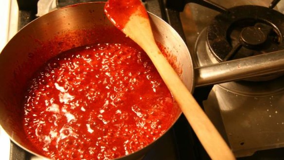 Strawberry jam on the boil.