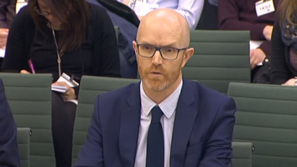 Simon Milner, Policy Director for the UK, Middle East and Africa for Facebook in front of the Home Affairs Select Committee in the House of Commons, London