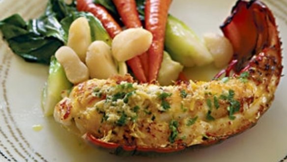 Lobster with ginger and coriander butter and stir-fried vegetables