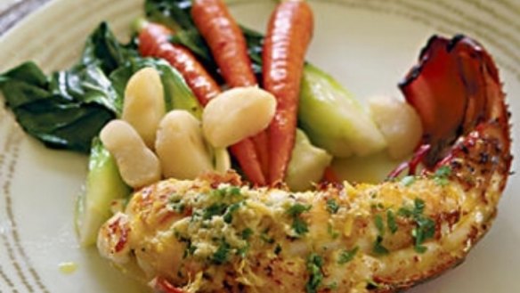 Lobster with ginger and coriander butter and stir-fried vegetables