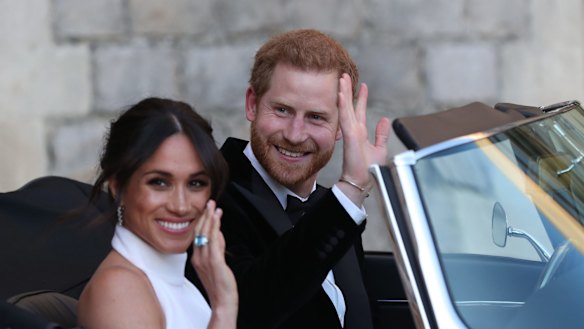 The newly married Duke and Duchess of Sussex in the E-Type Jag.