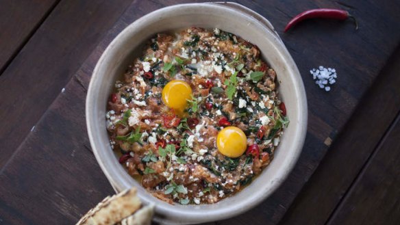 Menemen: eggs mixed with tomatoes, baby spinach, feta and optional chilli.