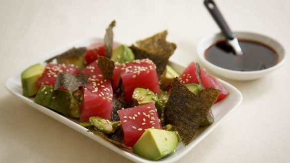 Tuna sashimi with avocado and ponzu dressing.
