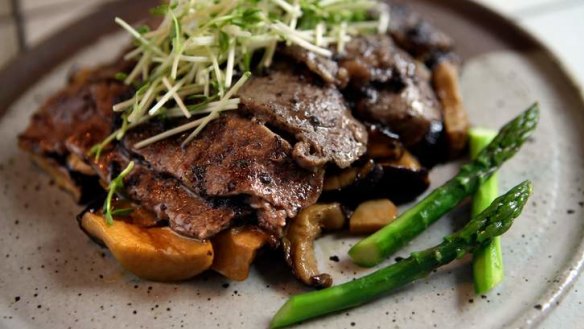 Wagyu oyster blade steak with mushrooms.