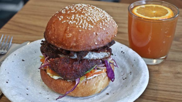 The Korean-esque fried chicken burger on a soft bun with kimchi and mayonnaise.