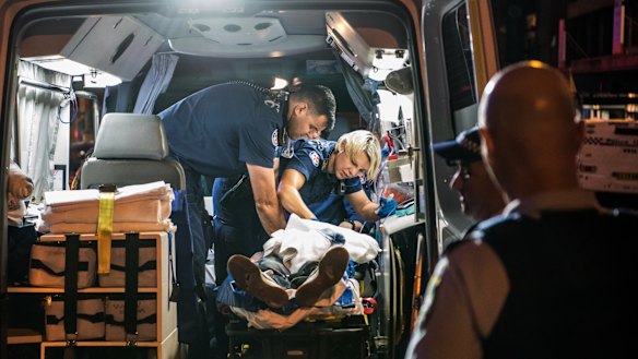 NSW Ambulance Paramedics perform CPR on a 40-year-old male who collapsed with a cardiac arrest at Easts Leagues Club. 