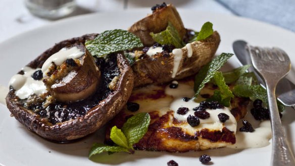 Grilled mushrooms with garlic, tahini and haloumi.